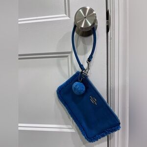 Coach Vibrant Blue Wristlet with Pom Pom
